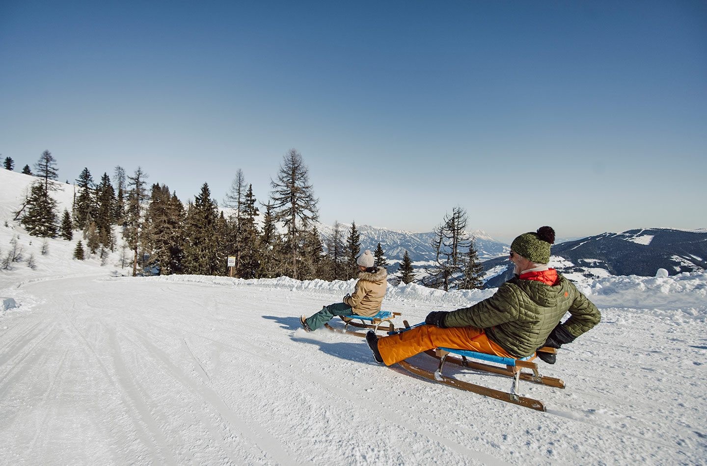 Schlittenfahrer auf der Hochwurzen Rodelbahn